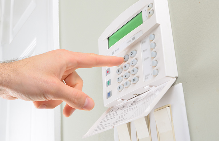 ¿Cómo bajar el volumen del teclado de alarmas USS?